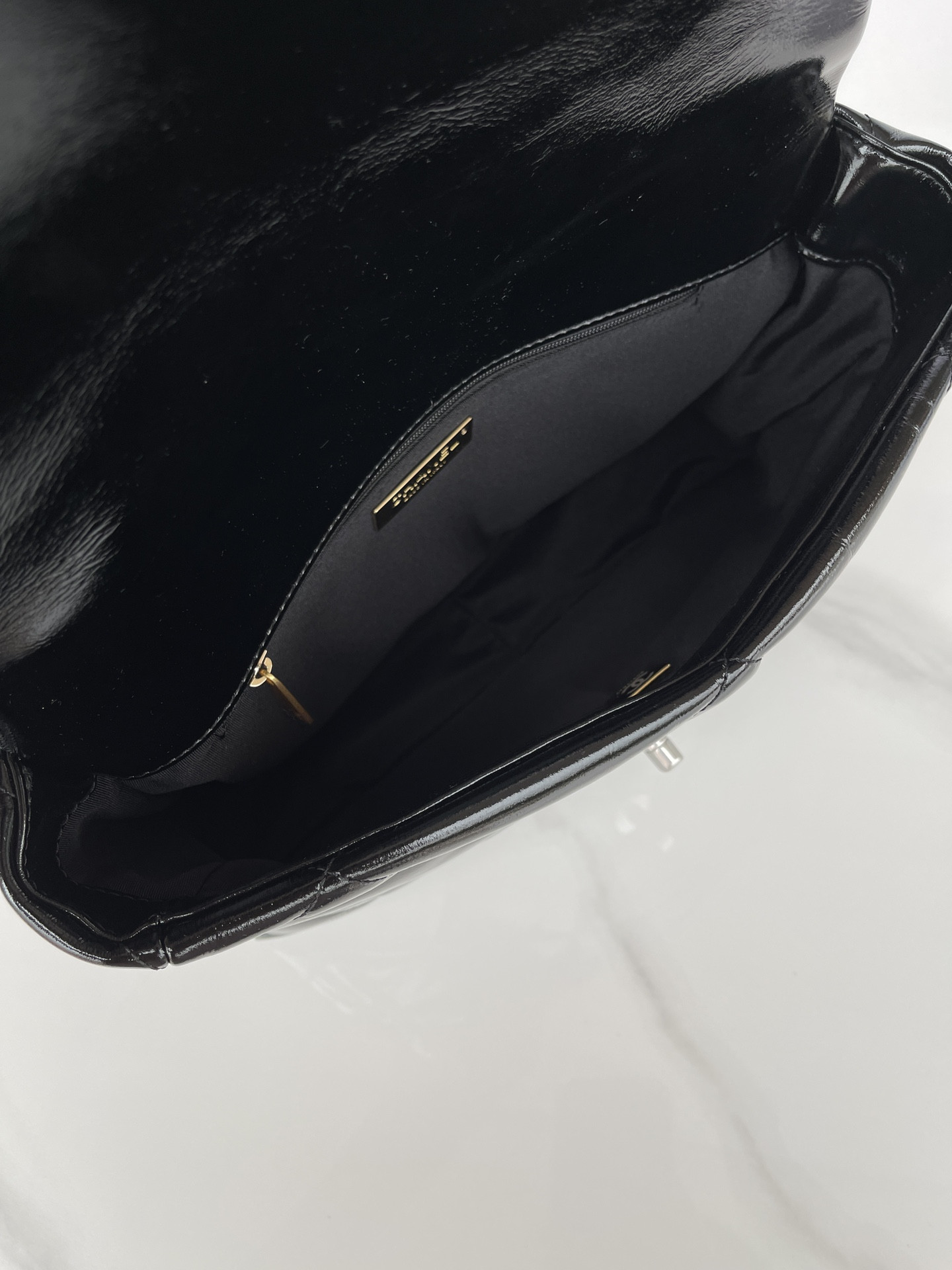 Ch*el 19 large handbag shiny leather, gold-tone, silver-tone & ruthenium-finish metal black 7.8 × 11.7 × 3.9 in