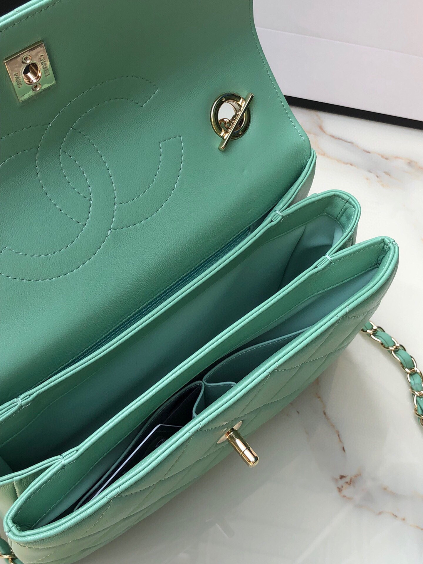 Ch*el flap bag with top handle 6.6 × 9.8 × 4.7 in