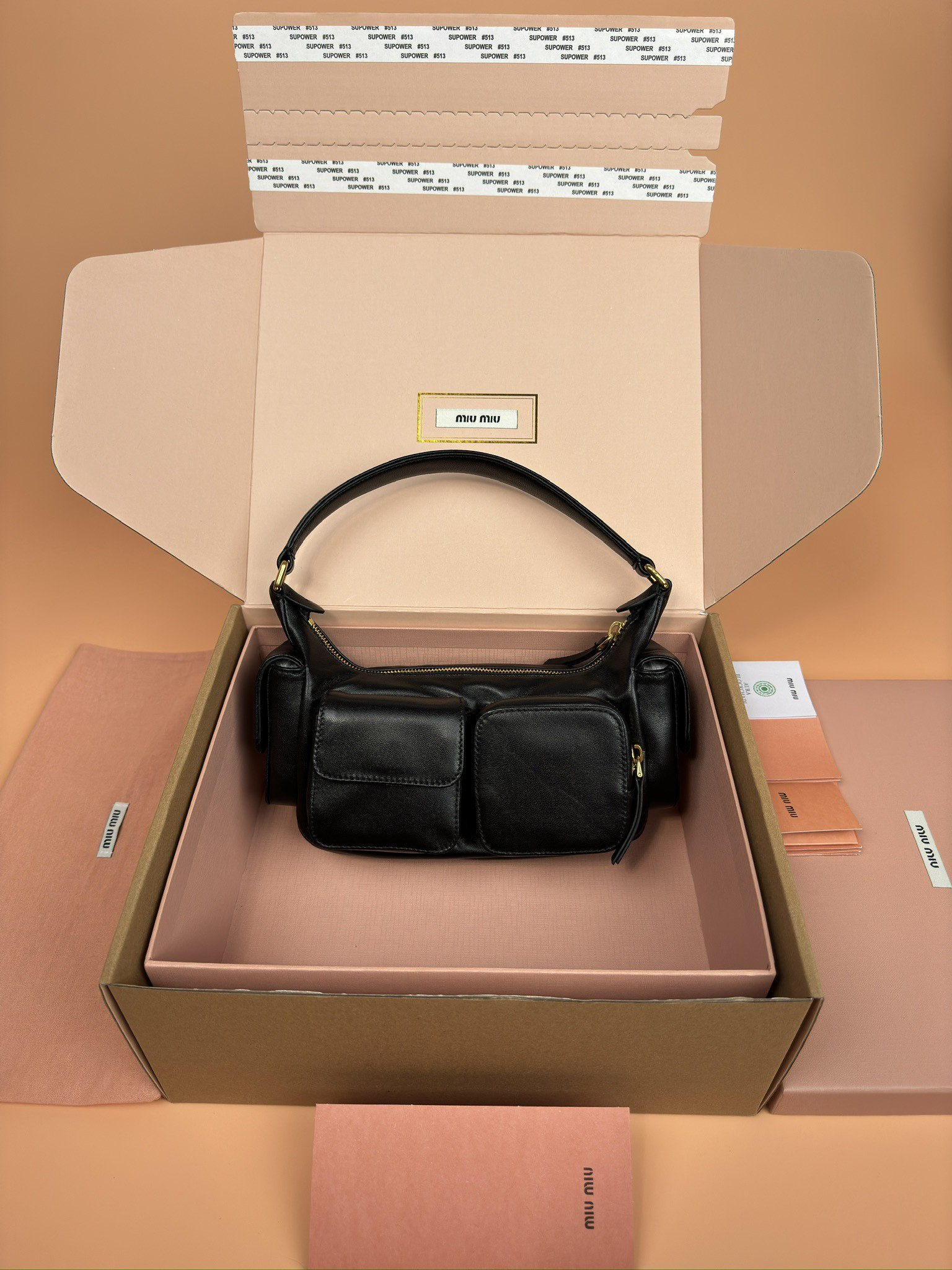 Miu Miu Hobo Nappa leather pocket bag 12x21x6cm