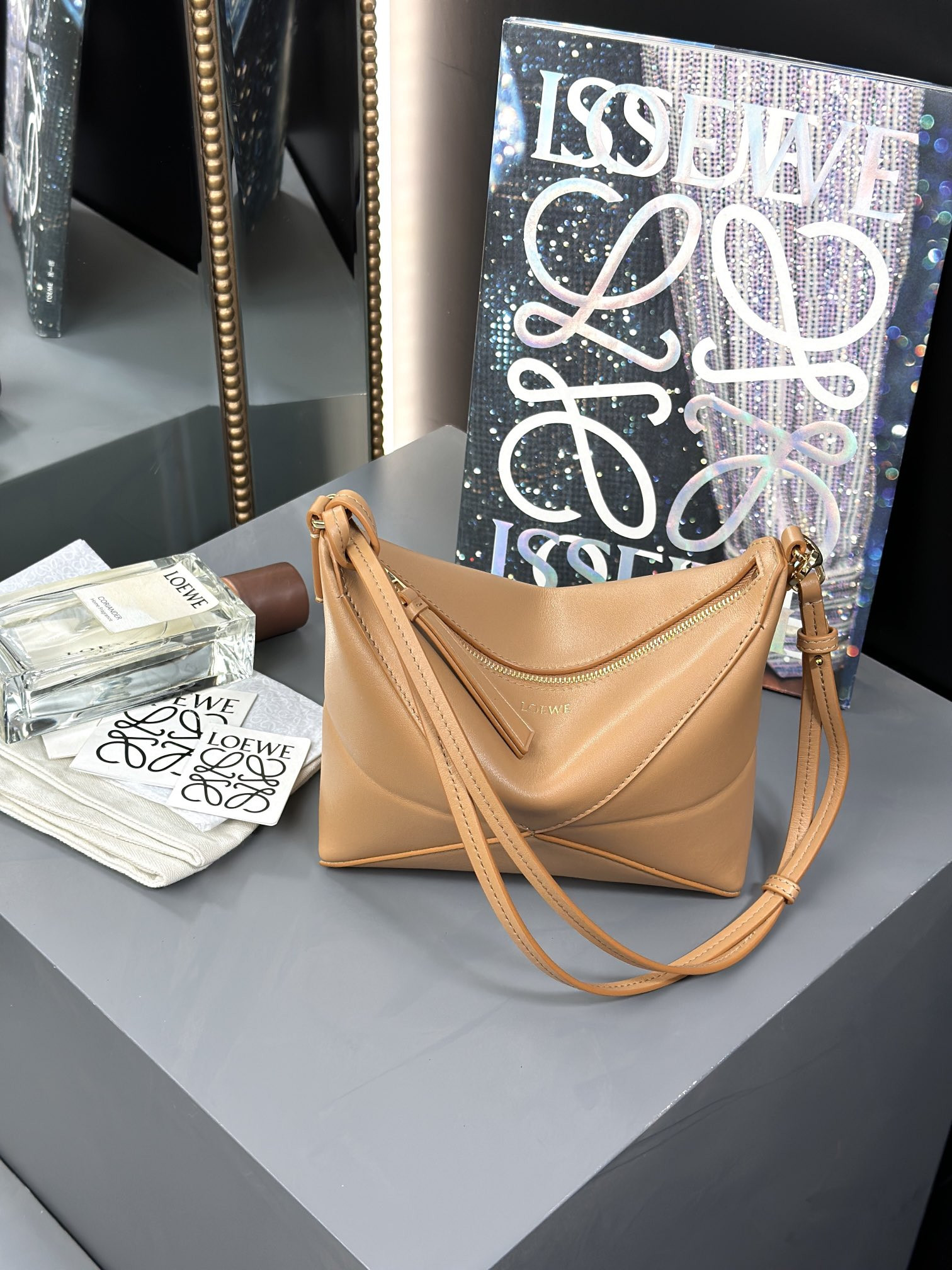 L0ew* puzzle fold pouch in shiny nappa calfskin 15.5x23x6.5cm